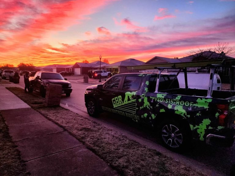 sunset over Gillean Brothers Roofing in Denton