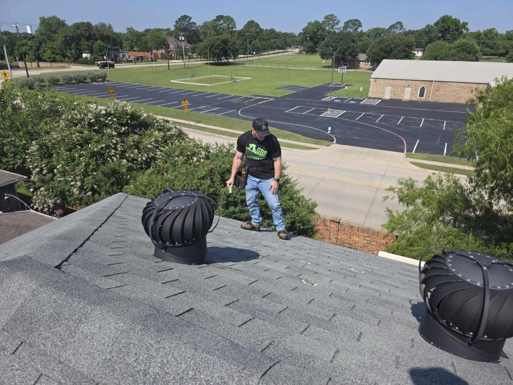 marking hail damage on a Denton TX roof